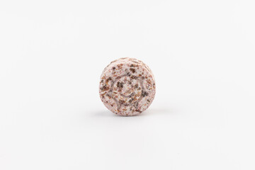 Heap of medicine colored pills, tablets on a white background