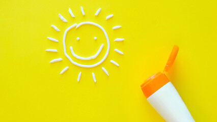Sunscreen. Protect skin from sun.  Sun with smiling face drawn with cream and cosmetic tube on a...