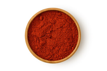 Paprika powder in wooden bowl on white background