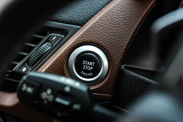 Close up engine car start button. Start stop engine modern new car button,Makes it easy to turn...