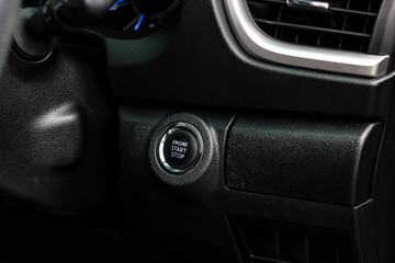 Close up engine car start button. Start stop engine modern new car button,Makes it easy to turn your auto mobile on and off. a key fob unique ,selective focus	