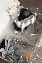 Top view of christmas decoration in storage silver box for home decor for winter holidays