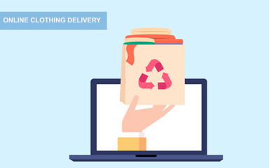 Contactless delivery of goods supplies paper bag with cloths online shopping concept.