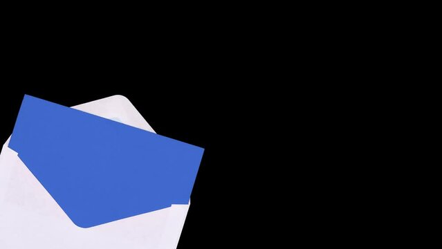 White letter envelope containing a blue paper enters and exits the scene from a corner. Stop motion animation.