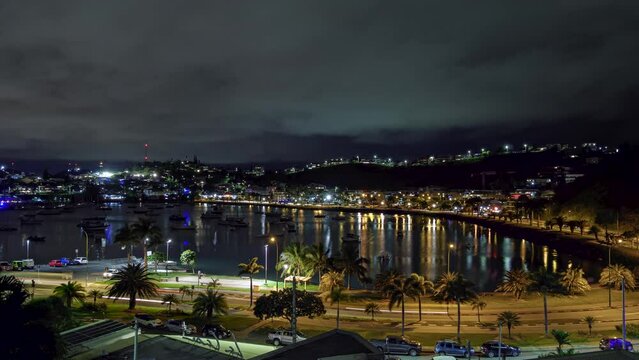 Timelapse of traffic, nightlife, boats on Orphelinat Bay in Noumea, New Caledonia.