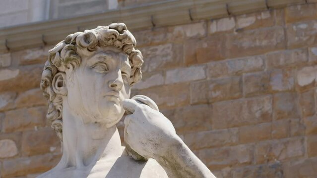 Michelangelo's David sculpture in Piazza Della Signoria on a bright sunny day close up still