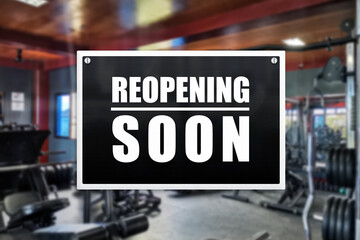 Reopening sign of a gym or fitness center. Concept of business recovery or lifting of restrictions.