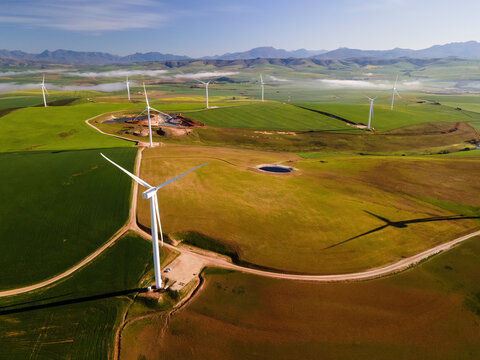 Aerial view of Overberg wind farm with green fields Western Cape, South Africa.