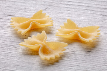 durum wheat pasta on white wood