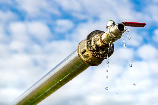 Clear Water Artesian Well, african hold-ups with water water from the spring source of clean water