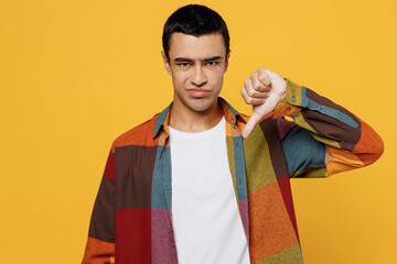 Young dissatisfied displeased middle eastern man 20s he wear casual shirt white t-shirt showing...