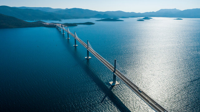 Aerial view of Peljeski bridge, a suspended railroad and highway crossing the Bay of Mali Ston in Croatia.
