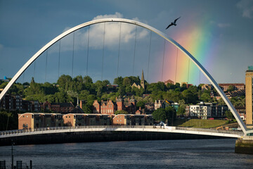 Fototapeta na wymiar Rainbow over Millennium Bridge Newcastle