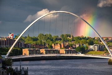 Fototapeta na wymiar Rainbow over Millennium Bridge Newcastle
