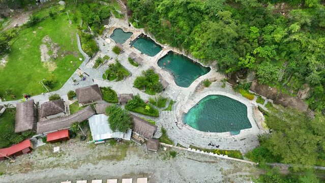 Aerial fly drone view of hot spring Cocalmayo, Santa Teresa, Peru, Andes, South America. It is close to Machu Picchu on the Salkantay and Inca trail vey famouse for hiking and trekking.