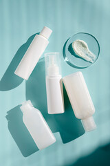White, plastic beauty products bottle. Blank cosmetics bottle.
