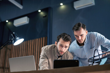business colleagues are enthusiastically working on the development of a new project.