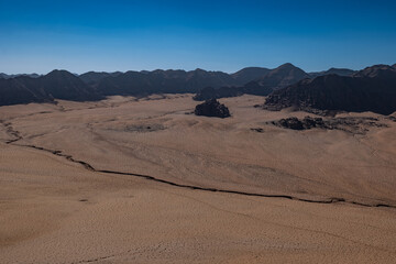 Fototapeta na wymiar Wadi Rum desert and rock formations on a sunny day, Jordan landscapes