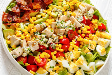 American garden salad on plate, top view
