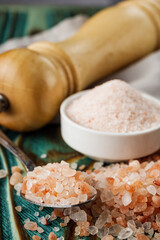 pink Himalayan salt on a wooden rustic background