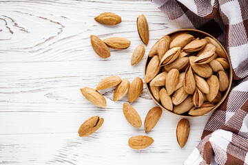 fresh almonds in shell on a white background