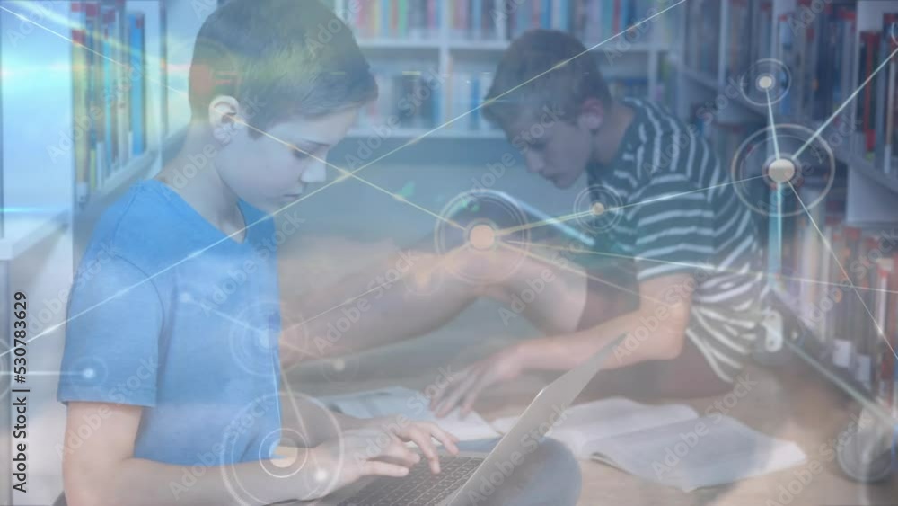 Poster animation of network of connections over diverse schoolchildren using laptops