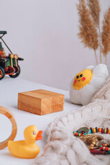 Background with children's things. Composition for the presentation of a product, brand, product. Children's figures.