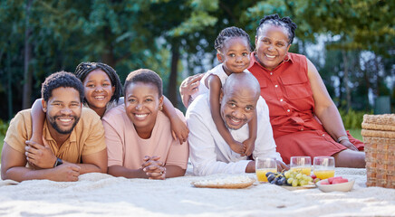 Love, picnic and family time with black people smile and relax at a park or forest, bonding and having fun. Portrait cheerful girl enjoy weekend with grandparents and parents, playing and embracing