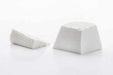 Ricotta cheese isolated on white background