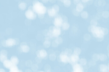 Abstract light blue blur bokeh for background, light blur on high light blue gradient abstract background in central design for presentation.