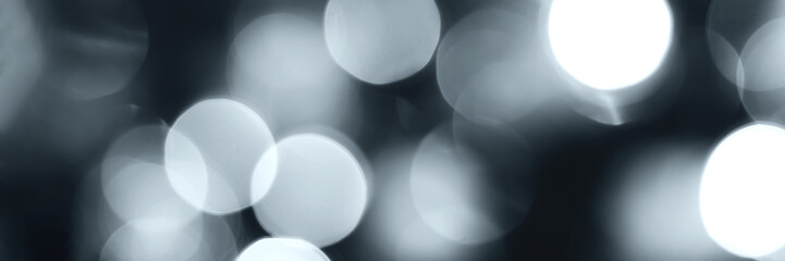 Blurred lights, gray, deep blue background, banner texture. Abstract bokeh with soft light header....