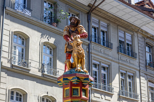 View of Samson Fountain. It is part of the allegorical fountains of medieval origin in Bern, Switzerland