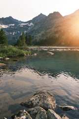 Vertical postcard. Summer in the mountains concept. warm, cozy sunset light.