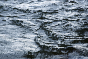 dramatic monochrome background with river water surface