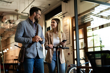 Business people in office talking. Beautiful businesswoman talking with colleagues..