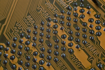 contacts on the surface of the motherboard from the computer. close-up