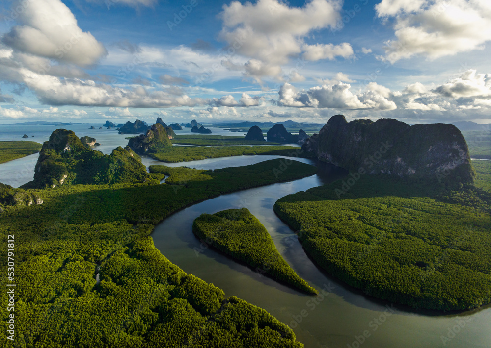 Wall mural aerial view mangrove forest and mountain peak of phang nga bay, thailand