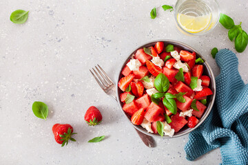 watermelon salad with strawberry mozzarella cheese basil. healthy summer dessert