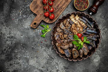 Fried potatoes, Baked purple sweet potatoes with bacon on a metal tray, banner, menu, recipe place for text, top view