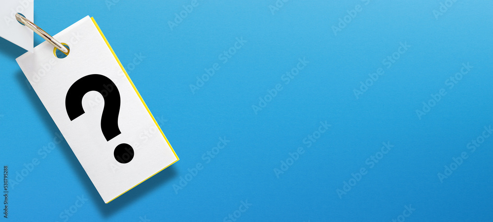 Poster note paper with question mark on blue background