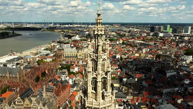 vertical rise to the top of the tower of cathedral of our lady in Antwerp, Belgium. It shows the modern architecture and the precision of the building. Heart taking view of the top.