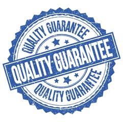 QUALITY GUARANTEE text on blue round stamp sign