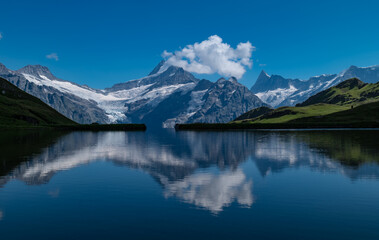 Fototapeta na wymiar Bachalpsee lake in the Swiss Alps on a sunny summer day