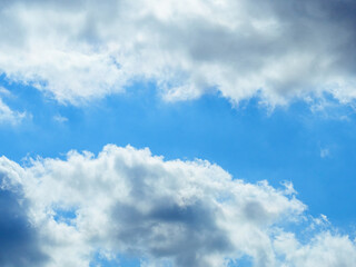 Naklejka na ściany i meble Overcast clouds against the backdrop of the blue sky