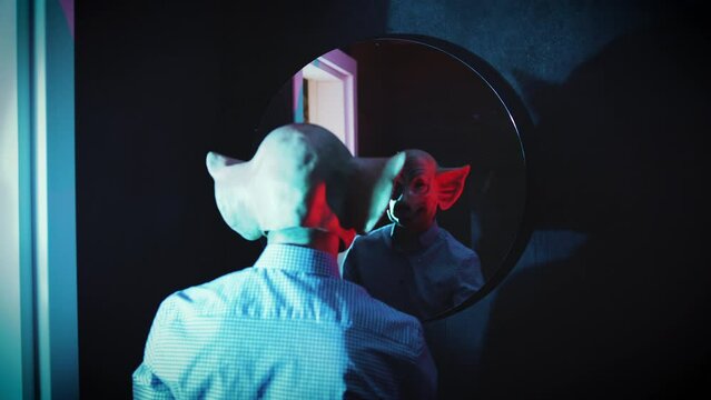 freak sprayed with perfume in font of the mirror horror demon mask 