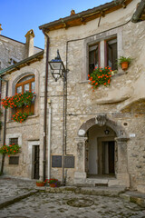 The facade of an old house in Barrea, a medieval village in the Abruzzo region of Italy.