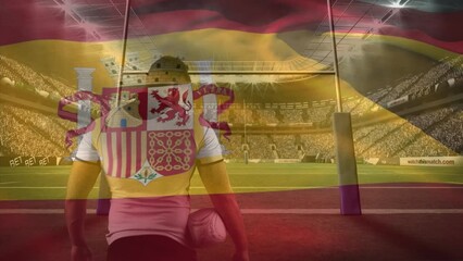 Animation of flag of spain over caucasian rugby player at stadium - Powered by Adobe