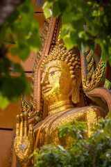 Fototapeta premium Beautiful big Buddha sculpture in Kanchanaburi, Thailand