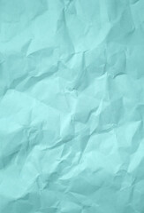 Turquoise crumpled paper texture background