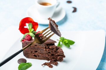 delicious chocolate cake. Food recipe background. Close up. Layered chocolate cake